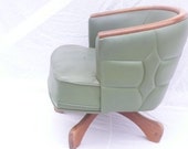 Mid Century modern swivel chair in olive naugahyde