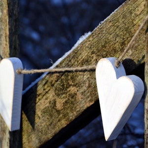 Heart garland in a shabby look made of wood for wedding entrance Valentine's Day