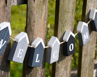Wooden house garland Sweden entrance door Scandinavia welcome