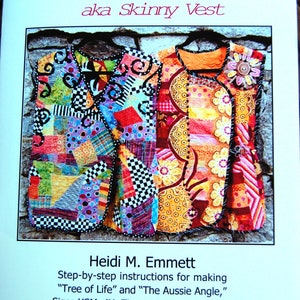 May include: Two colorful patchwork vests, one with a black and white checkered pattern and the other with a floral pattern, are displayed on a stone background. The text "Terrific Tabard aka Skinny Vest" is at the top of the image. The text "Heidi M. Emmett" is below the image. The text "Step-by-step instructions for making "Tree of Life" and "The Aussie Angle," Sizes XSM-4X. Tissue pattern included." is below the text "Heidi M. Emmett". The text "Another "Art-To-Wear" vest from designer Heidi Emmett! Each vest finishes just below the hip for a slimming silhouette. Adjustable sides add to the "skinny" look. Make the most of large-scale printed fabrics with your own version of this versatile design." is below the text about the sizes. The text "stash buster!" is at the bottom of the image.