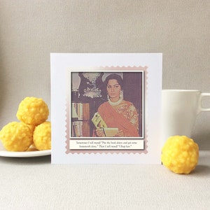 May include: A white card with a pink border and a photo of a woman holding a book. The text on the card reads "Sometimes I tell myself "Put the book down and get some housework done." Then I tell myself "Chap kan""