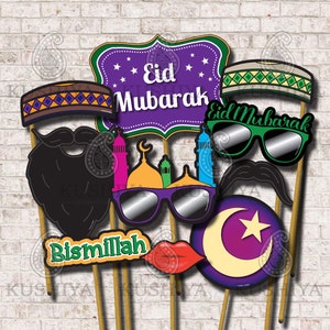 May include: A set of 10 Eid Mubarak photo booth props. The props include a beard, mustache, sunglasses, a crescent moon, a star, a mosque, a hat, lips, and two signs that say "Eid Mubarak" and "Bismillah".
