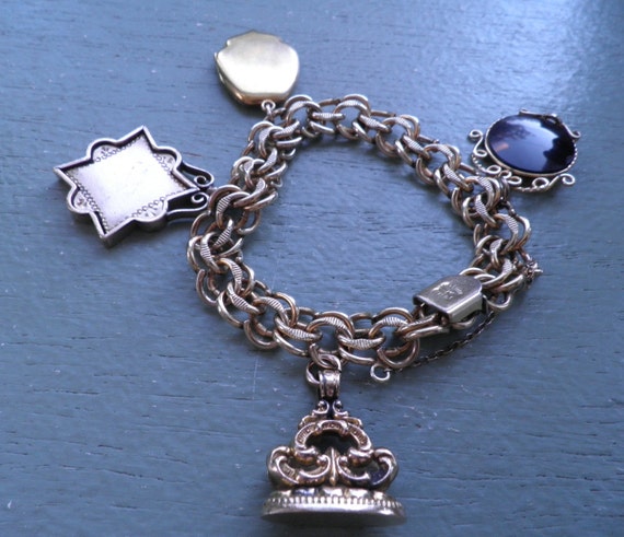 Designer by Forstner, bracelet, charms, Sterling and gold filled charms/chain.
