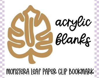 May include: A tan monstera leaf design with the words "acrylic blanks" in black script. Below, the text reads "Monstera Leaf Paper Clip Bookmark". The background has a light purple checkered pattern.
