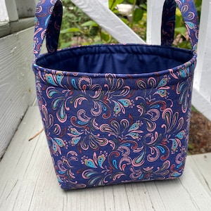 Shelf organizer, fabric storage bin in an abstract/modern print on blue cotton with navy blue cotton lining, two sizes