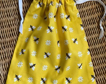 Gift bags in yellow cotton bumblebee print, white drawstrings