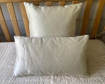 Quilted satin and embroidered pillow covers, two sizes, 18x18 or 12x20 inches.
