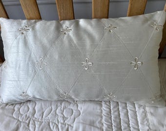 Quilted ivory satin pillows, 12x16" and 12x18", with embroidery detail