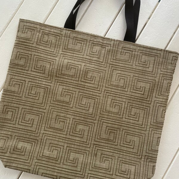 Medium sized shopping tote, rich tones of tan and taupe with embroidered Greek key motif