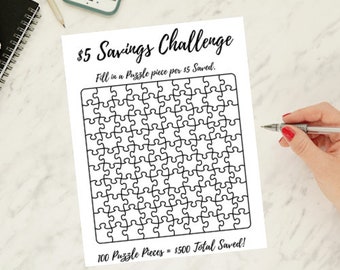 May include: A printable $5 savings challenge with a black and white puzzle graphic. Fill in a puzzle piece for every $5 saved. 100 puzzle pieces equals $500 total saved.