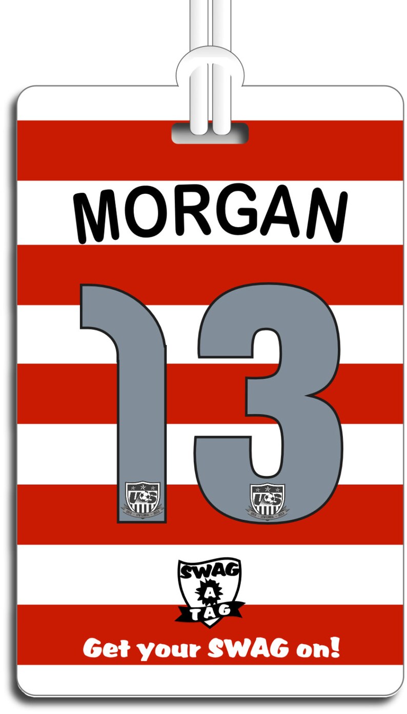 May include: Red and white striped name tag with the name "MORGAN" and the number "13" in gray. The tag also has a small logo with the text "SWAG A TAG" and the phrase "Get your SWAG on!"