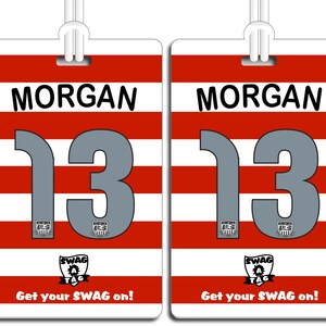 May include: Two red and white striped luggage tags with the name "MORGAN" and the number "13" printed on them. The tags have a black and white logo with the text "SWAG TAG" and the text "Get your SWAG on!" printed on them.