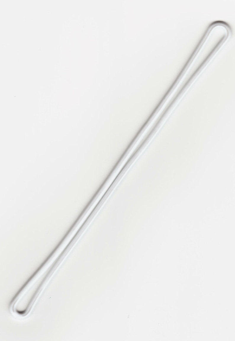 May include: A white elastic cord with two loops at each end.