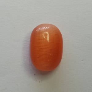 Natural Orange Cat&#39;s Eye Gemstone From India, 7.35 Carat, Oval Cut, GGL Certificate