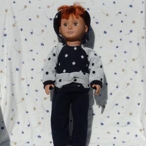Cute blue and white knit pants and hoodie in a blue and white polka dot print, fits 18-inch dolls