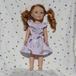 Cute pink dress in a white unicorn and rainbow print, fits 14.5-inch dolls.  This doll has a 6-inch waist.