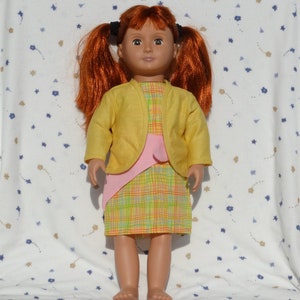 Cute pink and yellow dress in plaid print and pink tie at the waist fits 18 inch dolls Yellow stretch knit sweater and yellow lace underwear