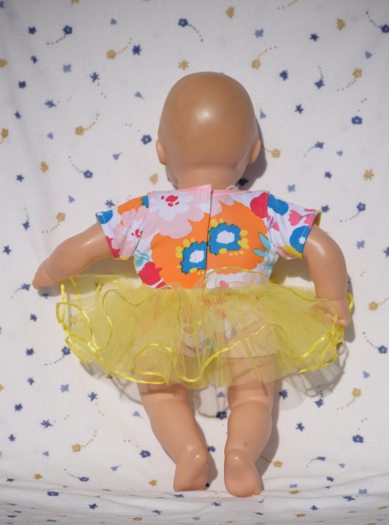 purple and blue flower print with a blue tutu fits 15 inch baby dolls Cute white leotard in a yellow pink