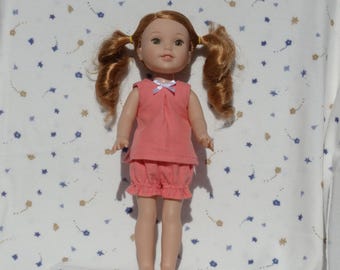 Salmon pink flannel pajamas with a white bow, fits 14.5-inch dolls