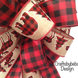 Red and Black Buffalo Christmas Tree Topper - Plaid Christmas Decorative Bow

Measurements
13 inches diameter ( round )
17 inches long Tails
2.5 inches wide ( wired ribbon )