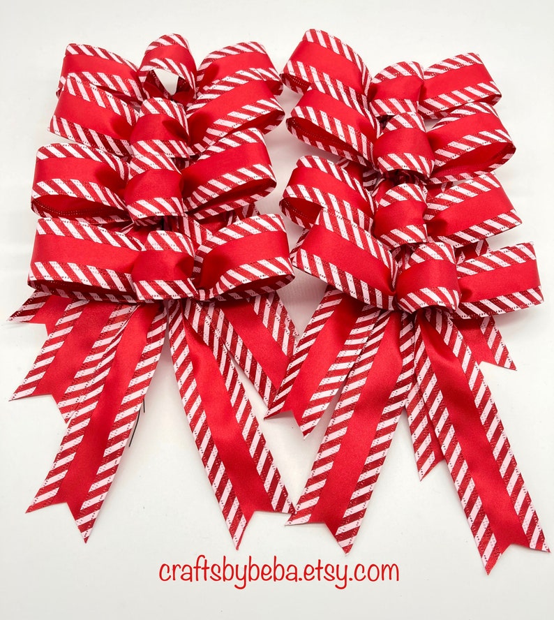 Christmas peppermint Tree Bows - Set 8 Bows - Red and White Christmas Bows 
Measurements
6 inches wide
6 inches long tails
1.5 inches wide
 ( wired ribbon )
