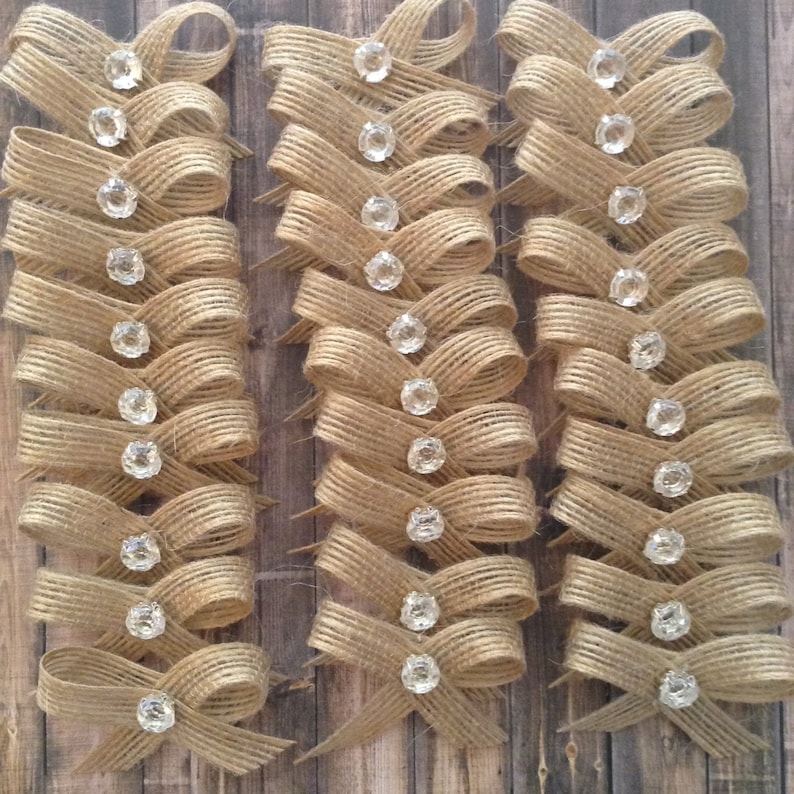 Burlap Small Decorative Bows Cute Rhinestone in the center - Set 30 Bows
Measurements
2 inches wide
3/8inches wide ribbon