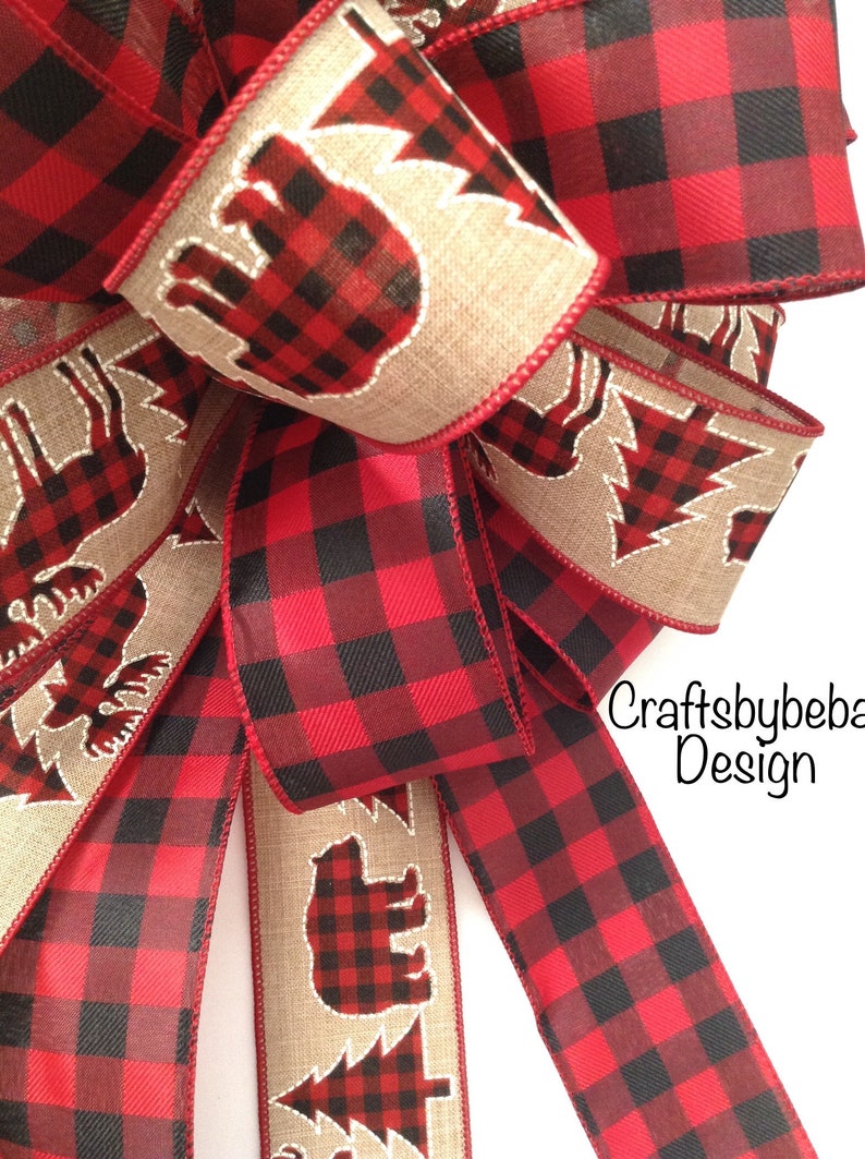 Red and Black Buffalo Christmas Tree Topper - Plaid Christmas Decorative Bow

Measurements
13 inches diameter ( round )
17 inches long Tails
2.5 inches wide ( wired ribbon )