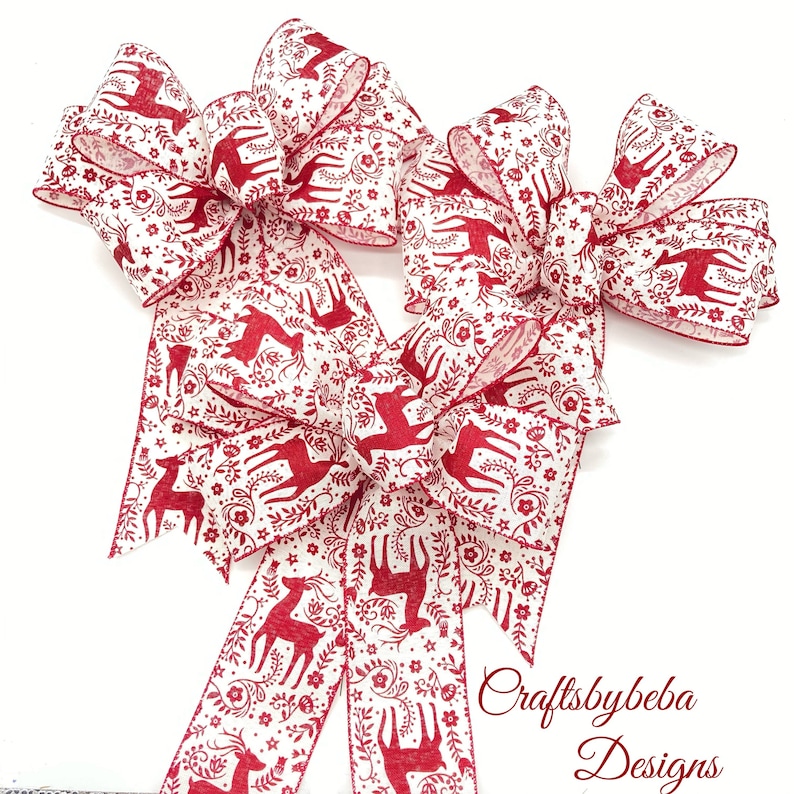 Red Burgundy Reindeer Christmas Decorative Bows - Set 3 Bows

Measurements
10 inches wide
10 inches long tails
2.5 inches wide ( wired ribbon )