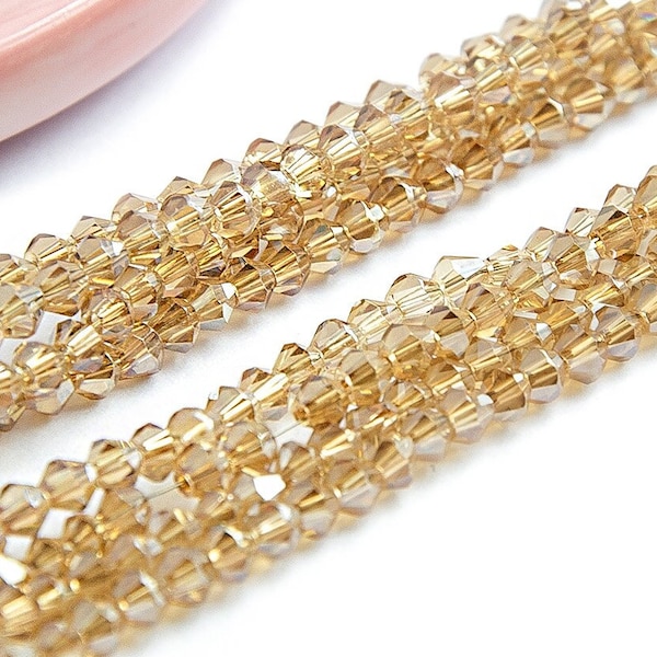 Perles x 125 toupies à facettes 3x3.5mm gold toupie verre 3mm perle à facettes 3mm dorée