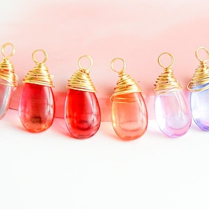 Glass drop pendant 17x08mm smooth glass drop colored pink tone