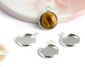 Pendentifs 14mm supports cabochons  14mm en acier inoxydable argent ,apprêts bijoux en acier .Pendentif médaillon pour collier.