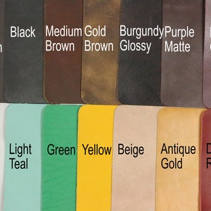 May include: A color palette featuring swatches of leather in various colors. The colors include dark brown, black, medium brown, gold brown, burgundy glossy, purple matte, purple glossy, light grey, light teal, green, yellow, beige, antique gold, and dark red.