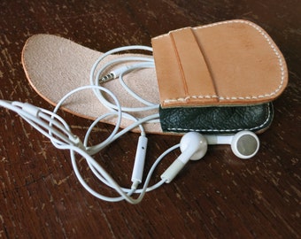 Leather pouch; natural undyed leather with green gusset