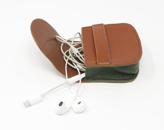 Leather pouch; tan leather with green gusset