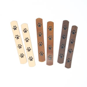 Leather bookmark with paw print motif