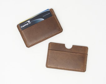 Simple leather card holder; holds three cards