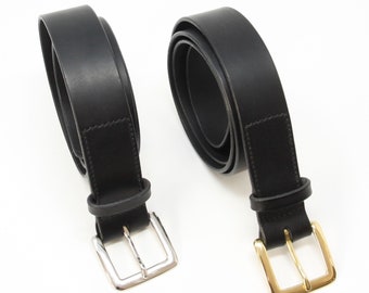 Black leather belt with solid brass buckle; 1.5" (38mm) wide; unisex; distressed leather; hand-stitched; burnished edges