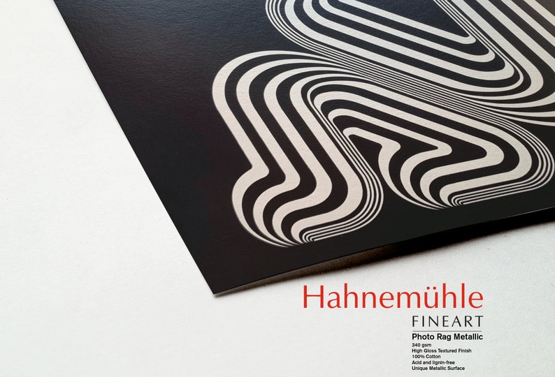 May include: Black and white abstract art print on a textured metallic paper. The print features a series of curved lines that create a sense of movement and depth. The paper is 340 gsm, high gloss, textured, acid and lignin-free, and has a unique metallic surface. Hahnem&uuml;hle FineArt Photo Rag Metallic.