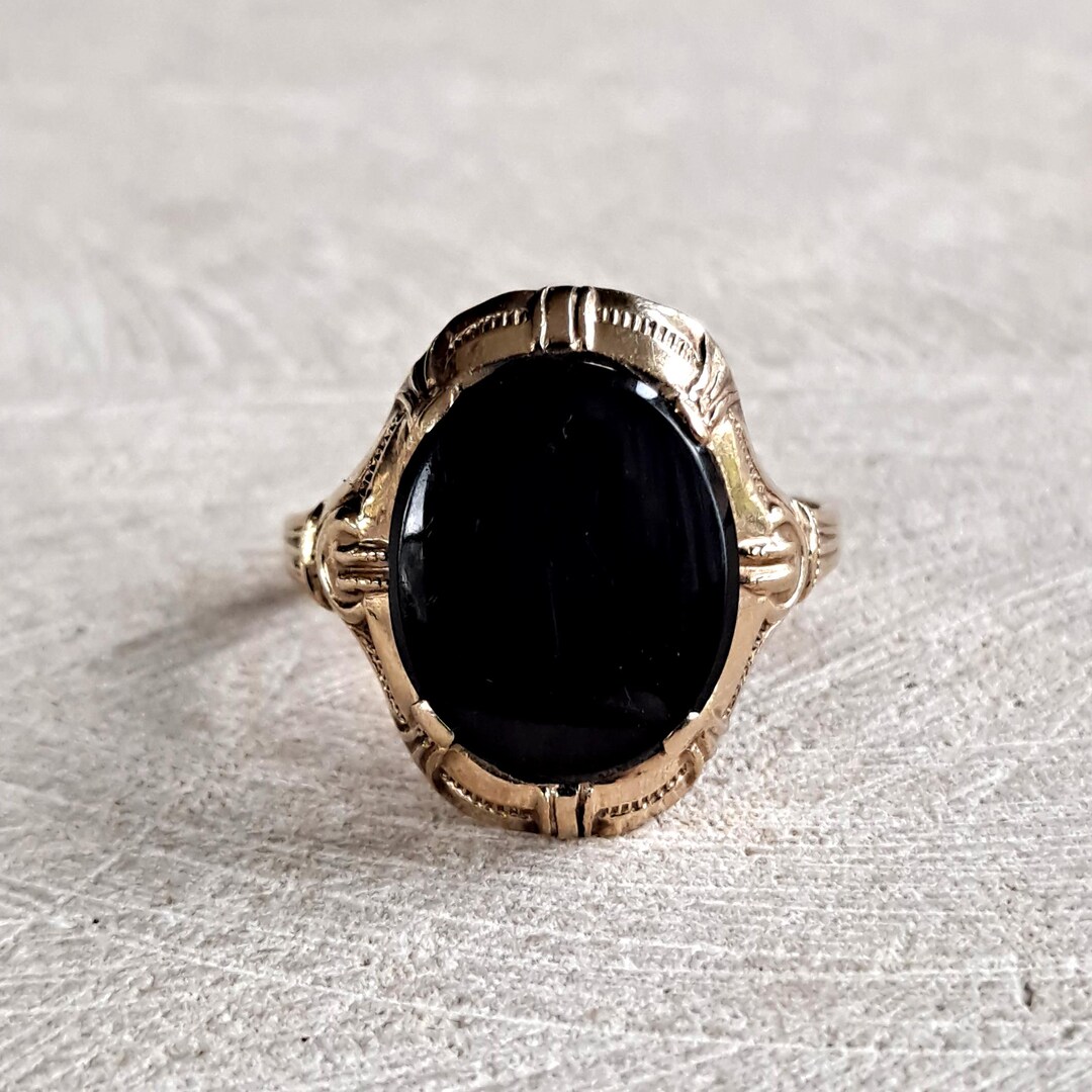 Sculptural gold & onyx ring