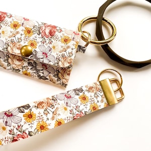 Monedero con forma de tarjeta con diseño de flores silvestres, llavero de piel sintética para la muñeca, brazalete de silicona, regalo y accesorio para novias, minicartera