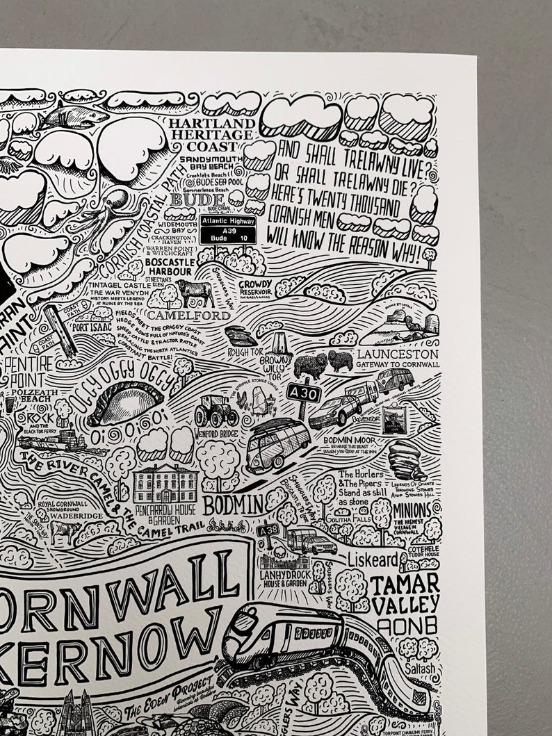 Detail of an illustrated map of Cornwall / Kernow featuring Falmouth, Newquay, St Mawes, Polzeath, Tintagel Castle, LandsEnd, padstow, Rock, The Lizard, Mevagissey, Mousehole, Marazion, St Ives, Looe, Truro