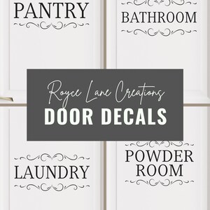 May include: Four white doors with black decorative door decals. The decals feature the words "Pantry", "Bathroom", "Laundry", and "Powder Room" with decorative swirls.