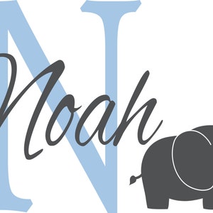 May include: A light blue letter N with the name Noah written in cursive script underneath. A gray elephant silhouette is to the right of the letter.