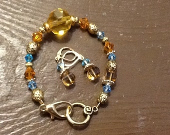 Handcrafted Bracelet and Earring Set with Swarovski Crystals and Goldtone Metal Beads