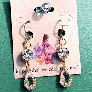 Perfect for the bride, Pretty Bling, Handcrafted Earrings with Pear shaped Glass Crystal Drop and Clear Crystal focal. Length from Top: 2”.