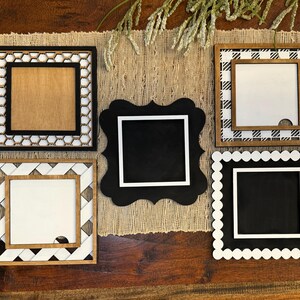 May include: Five different square picture frames with various black and white patterned borders. The frames are made of wood and have a rustic look.