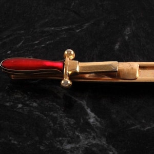 Vintage ANSON Sword Tie Clip Red Enamel Handle Signed Gold Plated Brass Pat Ped