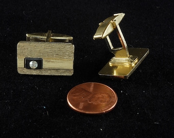 Occasion] Boutons de manchette Chanel Vintage Coco Mark Gold x Black Gold Matière CHANEL