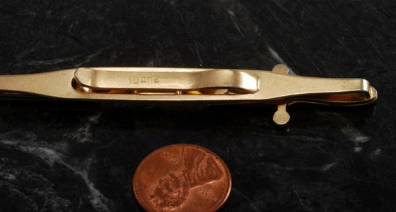 Trying to get a value or age of an Anson tie clip. I believe it is