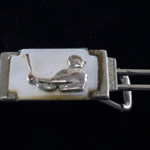 Pinza para billetes de jugador de béisbol vintage, de nácar sobre alambre de latón plateado, usada en los años 40.